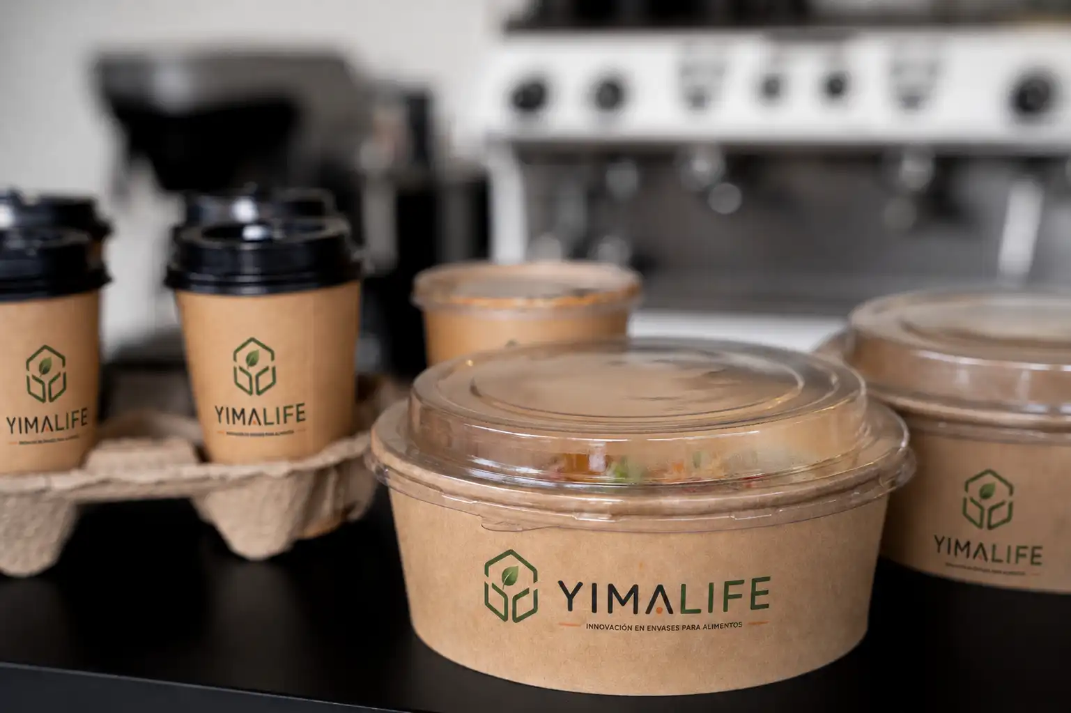 Custom branded coffee cups and salad bowls for foodservice